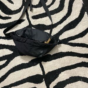 The North Face Black Crossbody Bag in perfect condition.